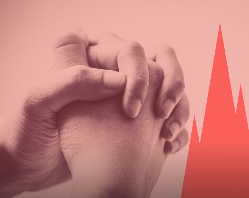 Deux mains enlacées symbolisant le pardon et la réconciliation selon les cinq langages du pardon