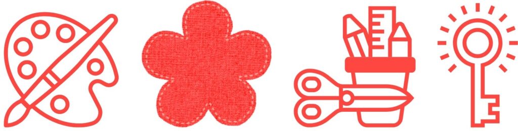 matériel créatif pour vision board de fin d'année : palette de peinture, fleur, ciseaux, crayons et clé de l'inspiration